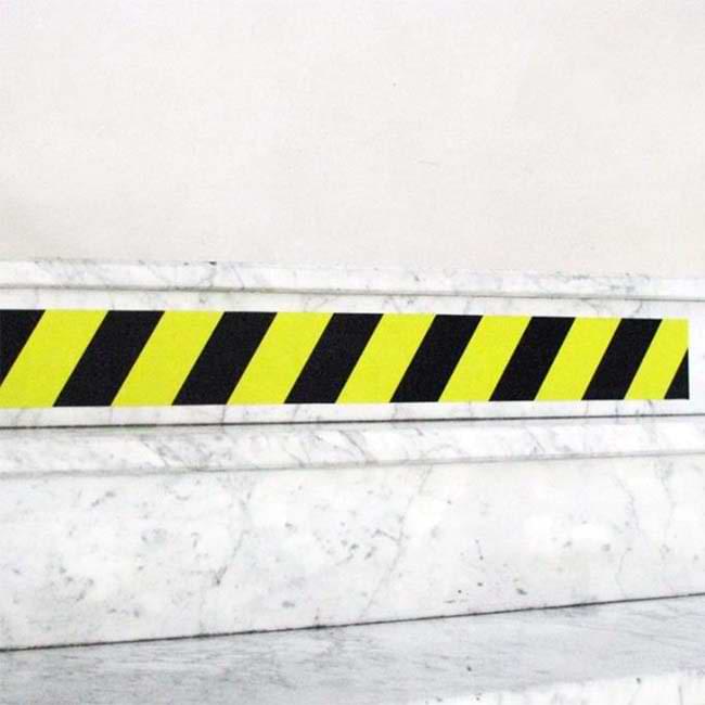 Bande adhésive contremarche noir / jaune - H. 100 mm X L. 10 m